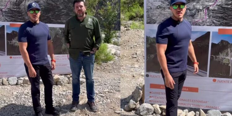 Two Men Stand on a Rocky Site Beside a Large Project Banner with Maps and Bridge Photos in the Background. - Entre Regios